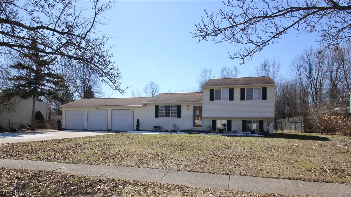 Welcome to this updated 3 bedroom, 2 full bath split level in a prime Stow location close to parks, shopping and easy access to Rt 8. 
Kitchen has been updated with new cabinets, back splash and all stainless steel appliances includes breakfast bar that opens to light and bright dinning room.
Large family room on lower level with office and full bath completely renovated with stand up tiled shower and new cabinetry.    
Second floor features three bedrooms with full bath completed renovated.  
The back yard is large,  private and fenced with shed.    Enjoy quiet evening on the stone patio in front of the fire pit.
Attached huge three car garage with built in work benches and plenty of space for all your projects.