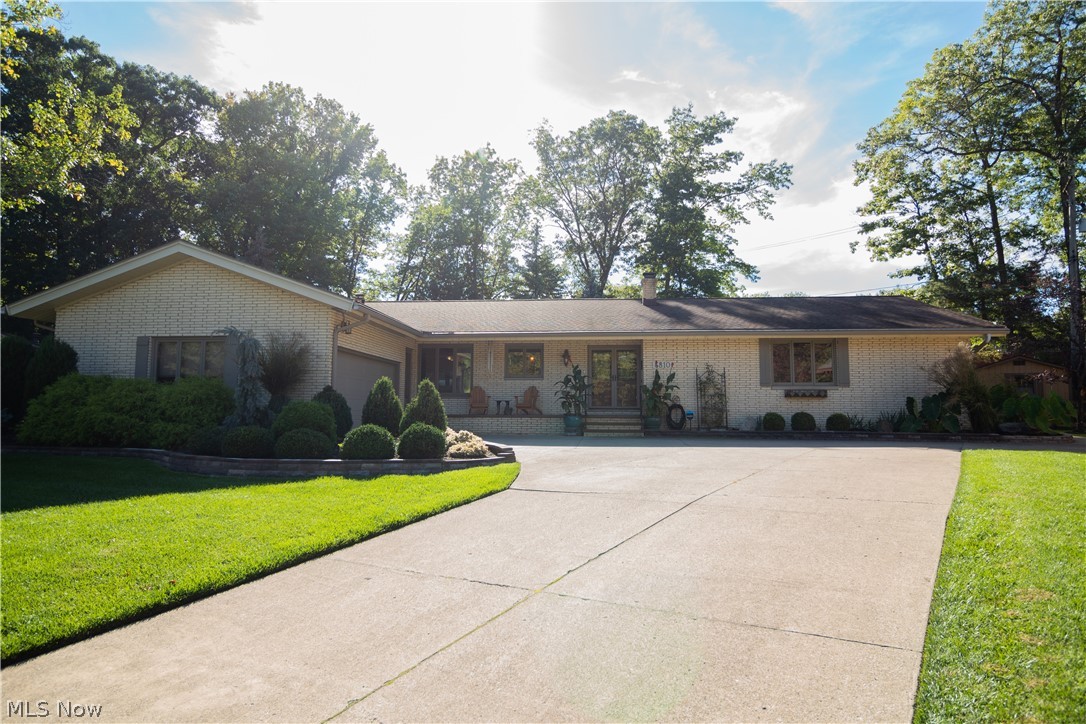 Seven Hills Gorgeous Brick Ranch located on a Cul du sac with Open Floor plan and Updated throughout! Gorgeous Eat in Kitchen features Granite Counter Tops, SS Appliances, Oversized Island, Walk In Pantry, Custom Cherry Cabinets and Ceramic Flooring that opens to the Huge Living Room with Stone Wall Gas Fireplace and Dining Room with a Wall of windows and Pella Sliding doors with Set in Blinds to overlook the Spectacular Outdoor Oasis. From the stamped concrete Patio, Beautiful Landscaping with water feature, Built in Viking Grill, Stone Built Fire Pit, Privacy Fenced Yard and Shed with Attached Tractor Port, you will never want to leave. The Master Bedroom has a Custom Designed walk in Closet and Private Full Bath with jetted Tub & Stall Shower. A Updated Jack-n-Jill Bathroom connect the generous Sized Bedrooms all with HDWD Floors. The 1st floor also features an Oversized Laundry room with storage, Half Bathroom, Mud Room and Foyer. The lower level doesn't disappoint either. Massive