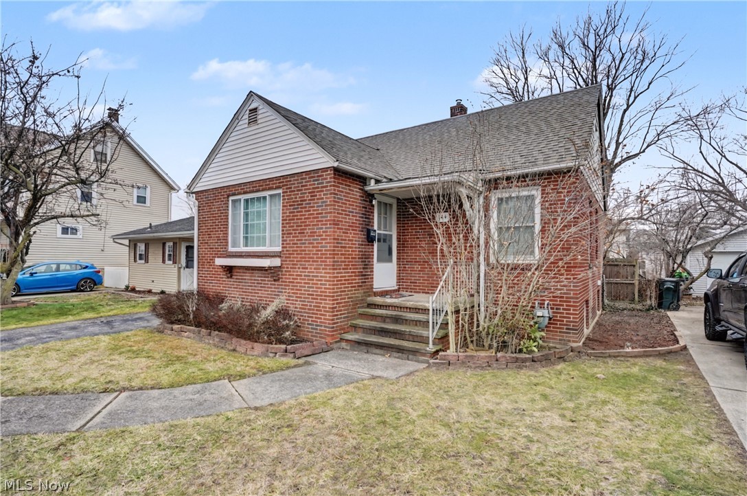 Welcome to this charming 3-bedroom, 1-bath Cape Cod in desirable Elyria! This nearly all-brick home offers fantastic curb appeal with a covered front porch and a newer roof. Step inside to find an abundance of natural light streaming through the windows and beautifully refinished hardwood floors. 
The spacious living room is freshly painted with new lighting, making it perfect for relaxing or entertaining. The kitchen features plenty of white cabinetry for storage, a designated dining area, and a view of the fully fenced backyard from the sink. 
Two main-floor bedrooms offer hardwood floors, newer windows, and updated blinds, along with convenient built-in storage in the hallway. Upstairs, you’ll find a large third bedroom with new carpet and a generous closet and cabinet space. 
The unfinished full basement includes laundry and plumbing/shower already in place for a potential second bathroom, offering a great opportunity to add more living space. Outside, enjoy a 1-car garage and fenced backyard.
Additional updates include fresh paint throughout, some plumbing updates, new lighting, updated outlets, and blinds. Conveniently located near highways, shopping, and local parks — don’t miss your chance to make 144 Roosevelt your new home!