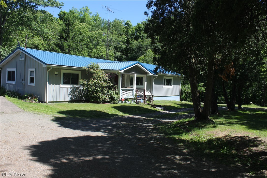 Discover the perfect blend of country living and modern convenience in this beautifully maintained 2-bedroom, 3-bath home set on 3 picturesque acres. Tucked away in a quiet rural setting, this property offers open skies, mature trees, and plenty of space to live, work, and play. Join us at 9:30am as we begin selling coins, antiques, tools, automobiles, farm tractors and equipment.  Real Estate sells at Noon!  We will be selling in two rings.  Bring a friend and come enjoy this absolute auction.