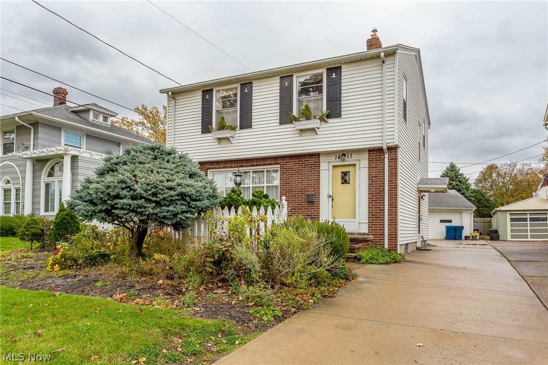 Custom built colonial within walking distance of Lakeview Park and the beach,  beautiful hardwood floors, custom kitchen, unique detail in kitchen and bath ceilings and  finished basement, detached 2 car garage, deck off the back of the house leading to a park-like backyard.  Home has been lovingly been maintained by the owner.  Driveway is not a shared driveway.