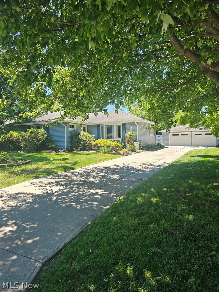 Great Avon Lake ranch home on iconic centrally located street. Sunset is a great mix of vintage redone cottage homes, new construction, and solidly built 60's classics like this home, one of those streets that is quintessential old school Avon Lake. Sunset Park is just steps away as is the entrance to Kopf Reservation LorCo Metroparks and paved trails galore. Sitting on a 105 ft wide oversized lot and a half lushly landscaped with sprinkler system , this 3 BR 2.5 Bath ranch home under same ownership since early 70's shows years of strong maintenance stewardship and has been lovingly cared for. Quality materials always used when upgrading. Family room addition provides great gathering space with sliding door leading to paver patio and lushly landscaped private back yard. Modern gas fireplace there with nice built ins flanking. Quality replacement windows. The skylit kitchen remodel received a quality reno 10 yrs, very lightly used and it shows. Nice appliances, thoughtful design & storage options. Slow close drawer and doors on maple Wellborn cabinets, and granite counters. A breakfast counter is open to the dining area. Master bedroom has a 1/2 ba ensuite. The finished rec room basement has a full bath rec room, workshop area, another work or storage room, laundry area as well. There was a 2nd hot water tank added for the added basement full bath. Generac generator provides peace of mind in times of heavy weather. Exterior sump crock and sewer separation just added. Walk up attic with non conditioned psace storage over house. This home awaits your personal touches, but the bones are absolutely solid. Sold as is with no repairs to be made, come get your opportunity to be part of classic Avon Lake.  vineyardbeachal.wixsite.com/association and  https://www.facebook.com/people/Vineyard-Beach-Association on facebook.