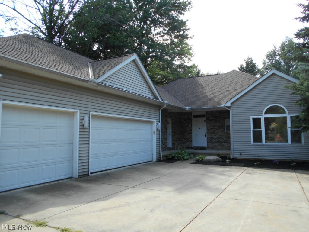 Wonderful one owner custom built ranch in lovely established neighborhood, close to the highways for easy access anywhere! Enter the private landscaped lot w/ circular drive to a  porch w/2 entrances to the home. The foyer opens to the vaulted LR & DR and eat in kitchen. Gleaming HDWD floors throughout the main living space & BDRMS. Spacious white kitchen w/ all appliances & breakfast bar adjoins large eating area w/ slider to deck & lovely backyard. The DR has a custom hutch builtin. The FR w/ vented gas FP opens to an airy sun porch w/ ceramic floors & beautiful windows. The Master suite has a vented gas FP, 2 walk in closets, a huge linen closet & a fabulous glamour bath w/ whirlpool tub,  oversized steam shower & vanity. The 2 additional BDRMS share another full bath. The secondary entrance to the home opens to the office area/laundry room w/ builtin desk area & washer, dryer & builtin ironing board.. There is also a half bath here. The lower level has a huge finished area w/ built