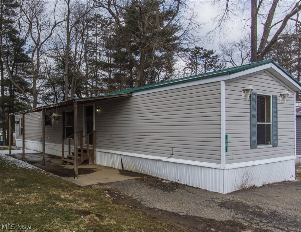 Ready to move in. Home ownership at your fingertips. Open concept 2 bedroom, 2 bath with large 10x12 storage shed. New metal roof installed in 2017 and hot water tank installed in 2018. Newer linoleum and sub flooring in front bedroom and linoleum flooring in bathroom. All appliances stay but not warranted. $260 lot rent includes trash, mowing, and snow removal. Electric budget $130, water $25.