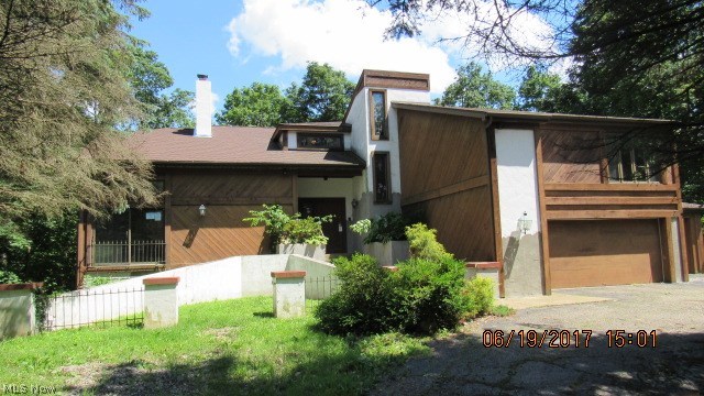 Large 2 story home with 3 bedrooms and 2.5 baths. Property has a 3 car attached garage and a 4 car detached garage, sliding glass door in kitchen, located on over 2 acres of land
