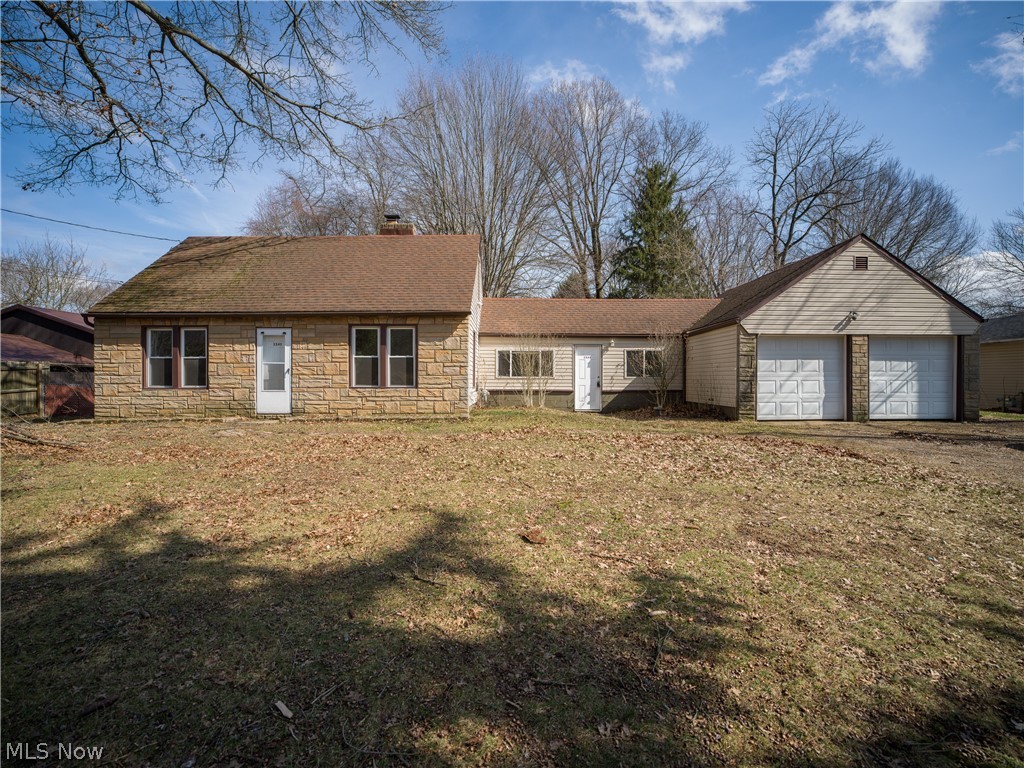 Enjoy convenient first-floor living in this beautifully updated Cape Cod set on over ¾ of an acre in Akron’s desirable Springfield area. This move-in ready home was fully refreshed in 2020 and is ready for its next chapter.
The updated kitchen features stylish luxury vinyl tile flooring, fresh trim and paint, a new sink, dishwasher, and a modern backsplash. The living room continues the updated look with new LVT flooring, fresh trim and paint, and a cozy, super cool fireplace ~ perfect for relaxing evenings.
The fully updated bathroom includes a new bathtub with tile surround, updated fixtures, vanity, commode, and LVT flooring.
A first-floor bedroom offers the ease and flexibility of main-level living, while two additional bedrooms upstairs feature new carpeting, fresh trim and paint, with new carpet continuing on the staircase.
Major mechanical updates add efficiency and comfort, including a tankless hot water heater for endless hot water, a high-efficiency furnace, and LED lighting throughout to help keep utility costs low.
Let's talk about the spacious breezeway ~ plenty of space connecting the home to the two-car garage, and a rear deck overlooking the large yard provides the perfect space for outdoor relaxation or entertaining.
