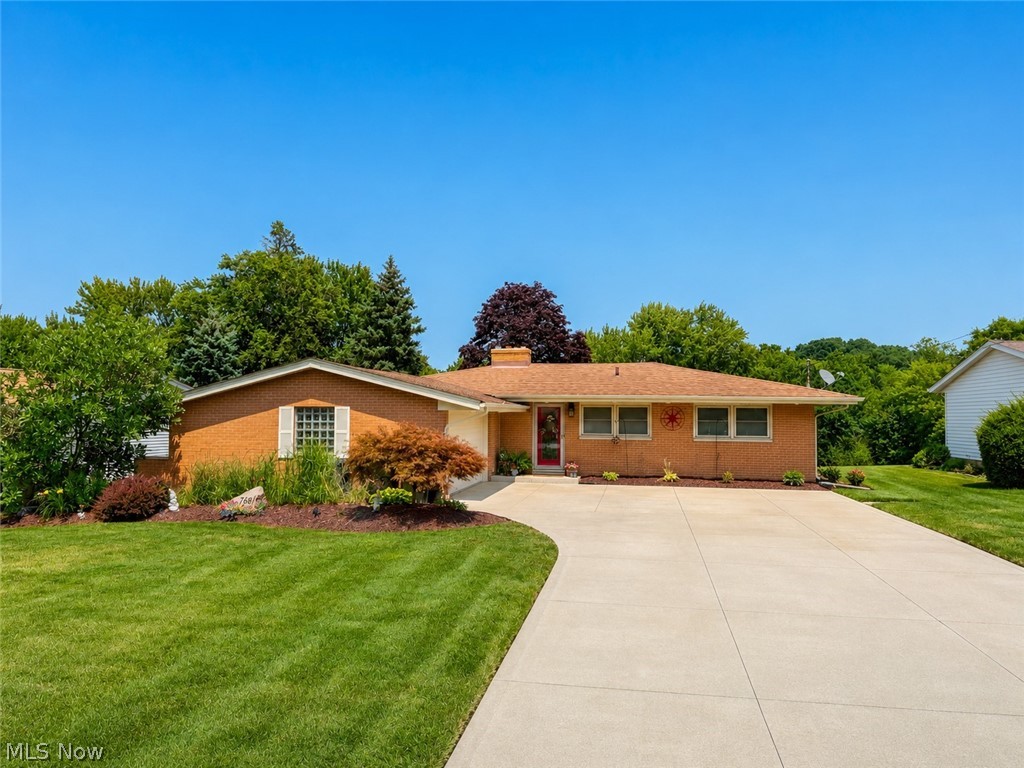 From the moment you arrive, you’ll know this is a home that has been meticulously maintained and thoughtfully cared for. Set on over half an acre, this stunning 3-bedroom, 2 full bath ranch offers modern updates and incredible outdoor living. Step inside to discover the spacious living room featuring a woodburning fireplace with sandstone surround, recessed lighting, and access to the outdoor space. Open the doors to the two-tier deck with pergola overlooking the parklike backyard and the adjoining stamped concrete patio. The dining room is perfect for everyday meals or special gatherings. The recently refreshed kitchen offers painted cabinetry, stylish tile backsplash, and newer stainless-steel appliances. Three spacious bedrooms provide plenty of space for family, guests, a home office or other hobbies. The primary suite is complemented by a beautifully renovated ensuite bathroom. The second full bathroom was updated in 2023 with a new vanity, shower surround, LVP flooring, and Bluetooth speaker. The basement adds even more living space with a sizable, finished rec room and bonus room plus an abundance of storage space, providing plenty of room to keep seasonal items and household essentials organized and out of sight. The expansive backyard offers over half an acre of possibilities with a beautifully maintained lawn, 12 x 12 shed with power, and plenty of room to play, garden, or entertain. The attached 2-car garage is truly a handyman’s dream! An ideal setup for a workshop complete with hot & cold water and electricity. Additional highlights include replacement windows throughout (2018), driveway expansion and new concrete (2019), thermal pane doors (2020), kitchen refresh (2022), appliances (2023), hallway bath renovation (2023), and primary bath renovation (2025). Conveniently located in Middleburg Heights with easy access to shopping, dining, parks, and major highways. This home reflects true pride of ownership. Move in and begin making memories!