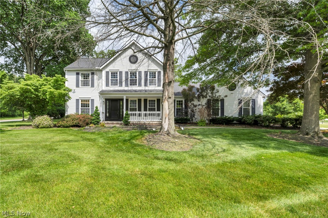Welcome to the desirable Ethan’s Green Golf Course Community! Situated on one of the largest lots in the neighborhood, this stunning Colonial offers 4 bedrooms, 4 full baths, a charming front porch, oversized 2 car attached garage. The inviting floor plan features a two-story foyer, formal dining room, living room, family room with fireplace, and a spacious kitchen with granite countertops, stainless steel appliances, and a breakfast nook with access to the private patio. A first-floor laundry room, bedroom and full bath add convenience. Upstairs, you'll find generous owner's suite with a walk-in closet and private bath, two additional spacious bedrooms and a full bath The finished lower level offers a large recreation area, theater space, bonus guest room with a full private bath and ample storage. Prime location near golf, shopping, dining, parks, and easy commutes. Don't miss this exceptional opportunity. Schedule your private showing today or visit the Sunday open house!