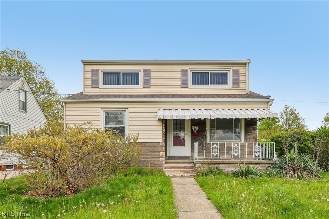 Updated Cape Cod across from Briardale Greens offering 3 bedrooms and 1.5 baths in a convenient Cleveland-area location with easy freeway access and a quick drive to downtown. Hot water tank (2025) and furnace (2023). Bright living room with hardwood floors and a large picture window. Formal dining room with hardwood flooring. Updated kitchen with ample cabinetry and functional layout. Two first-floor bedrooms with hardwood floors and an updated full bath featuring modern tile, new flooring, and updated fixtures. Spacious second-floor bedroom with built-ins and character. Partially finished basement includes rec room, half bath, and laundry area with washer and dryer hookups. Fully fenced backyard and oversized detached one-car garage. Move-in ready, well-maintained home in a desirable location near golf, parks, shopping, and dining.