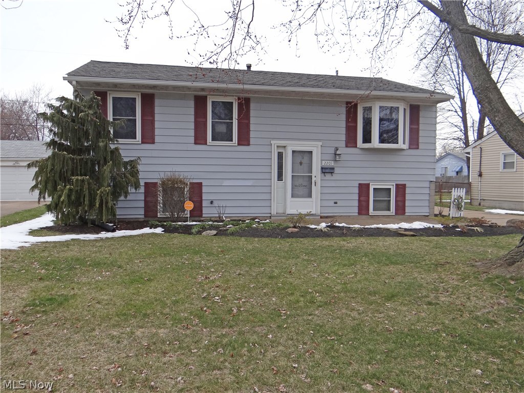 Move right in! This house has been meticulously cared for and is ready for its new owners. This is a large 3 bedroom, bi-level home with a fantastic kitchen addition. Step outside the kitchen door to find a deck that's perfect for bbq's and a pool where you will spend your entire summer. Many updates include a new furnace, hot water tank, and central air unit. In the family room the carpet is brand new and the fireplace was recently converted to gas. The oversized, detached garage is large enough for 2 cars and more.