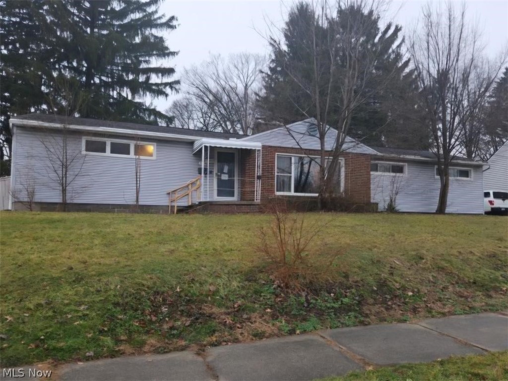 Wonderful opportunity for investors or owner occupant.  Spacious 3 bedroom ranch on corner lot in nice neighborhood with nearby access to Rt 8, I-77 and I-76 and Rt 224. Updated kitchen. Nice dining area with slider to large deck in a vinyl fenced back yard. Full basement with large recreation room and easy to finish out bonus room / office. Rec room and living room both have fireplaces.  Owned by Secretary of Veterans Affairs and sells as-is.  Buyer to choose their own title company and buyer to pay all title company costs and transfer costs.  Buyer or Buyer agent to verify all information herein. NOTE:  May take a few days for seller to open the on line offer entry module. The successful Offeror will be sent Seller's Proprietary Sale Agreement, which when executed, will replace any local office Offer or Purchase Agreement .. NOTE: We are now in a Multiple Offer situation.  Deadline to modify current offer or supply a NEW HIGHEST AND BEST Offer is Wednesday July 15, 2026 at 2 :)) PM EST