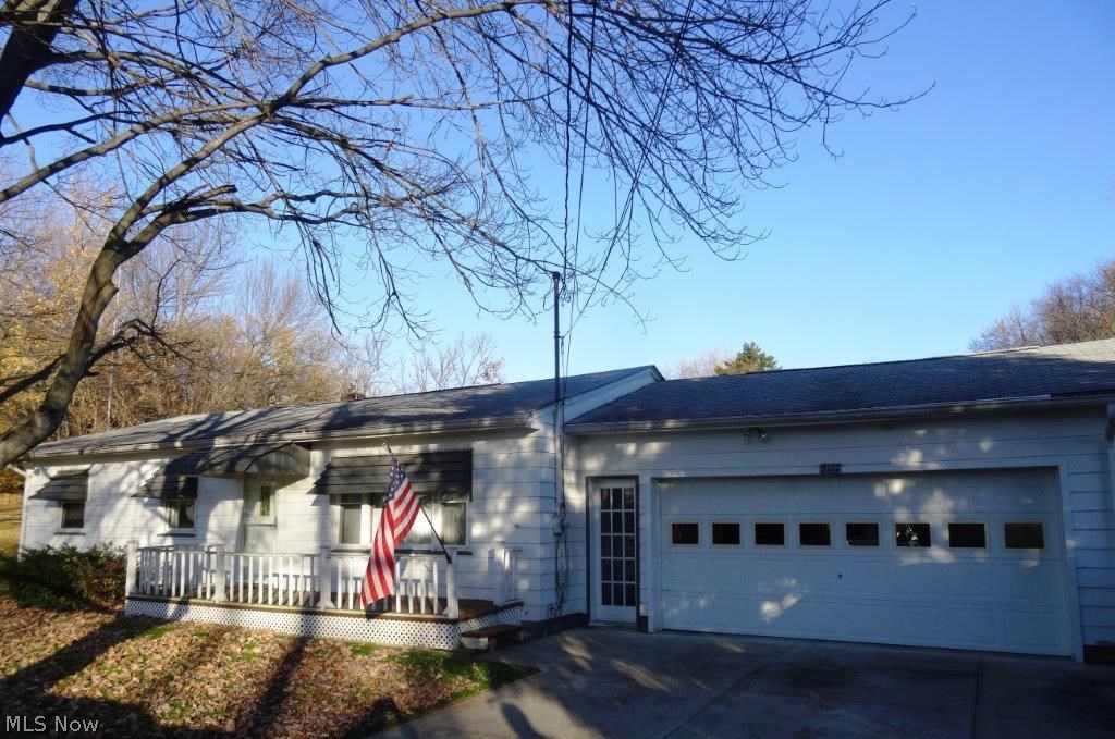Hard to find neat and clean 3 bedroom ranch on a huge lot in Green!  One floor living includes three nice sized bedrooms, full bath, attached 2 car garage, front porch and back deck, and a spacious flat lot with a big back yard!  Kitchen includes refrigerator and oven/range, washer/dryer also stay, hardwood flooring in living room and all three bedrooms is in very good condition. Driveway re-paved 2011, furnace/AC/hot water heater all 2008, updated vinyl windows, schedule today to make this home yours!