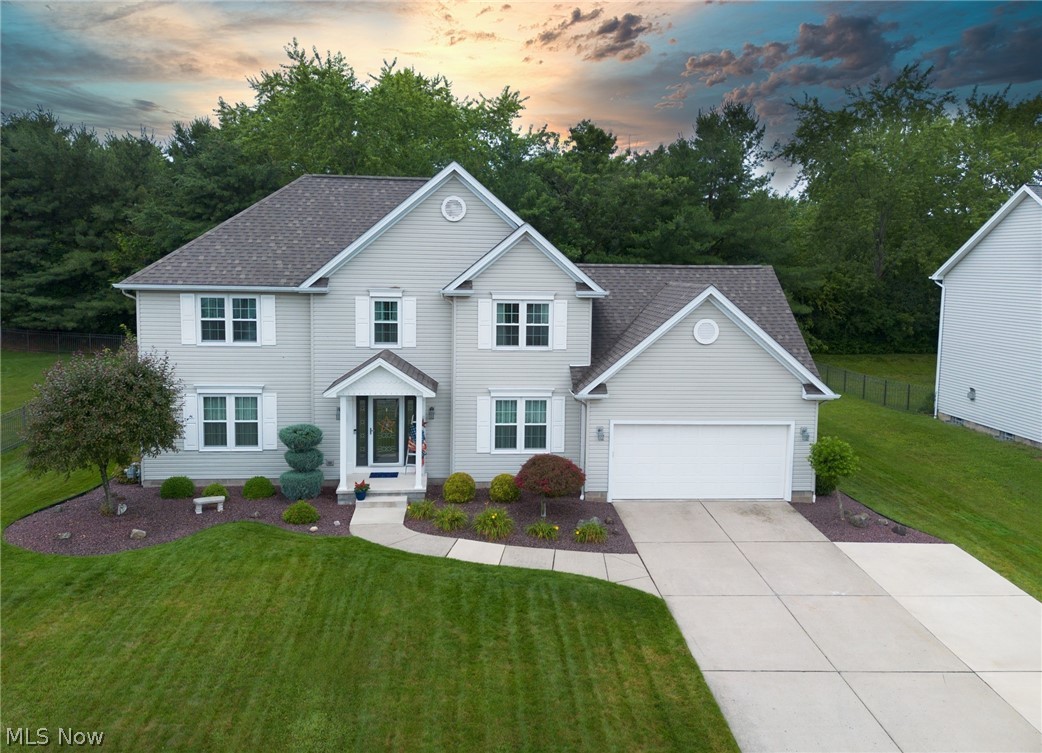 Welcome to 18 Morning View Circle, a beautifully updated, move-in-ready home in The Preserve, one of Canfield’s most desirable neighborhoods. Offering 4 bedrooms, 2 full and 1 half baths, and approximately 2,200 square feet of living space (plus a finished basement), this home has been thoughtfully updated with today’s buyer in mind.

The stunning remodeled kitchen serves as the heart of the home, featuring granite countertops, stainless steel appliances, new cabinetry, and modern finishes. Updated bathrooms, including the primary bath, and new carpet throughout create a fresh, stylish feel from the moment you walk in.

A newly added first-floor laundry room and mudroom provide everyday convenience, while additional laundry hookups in the basement offer extra flexibility.

The finished lower level is ready for entertaining and includes theater chairs, creating the perfect space for movie nights, sporting events, or relaxing with family and friends. Newer sump pump with battery back up system

Major improvements include a new roof (2022), all new windows (2022), all new updated landscaping, and a private backyard with a privacy wall/fence.  Additional driveway has been added for convenience. Nearly every major update  inducing all new toilets throughout have been completed within the last three years, giving the next owner the opportunity to move in and simply enjoy. 

Located in the highly sought-after Canfield Local School District, The Preserve offers the rare benefit of neighborhood sidewalks and direct access to the Mill Creek MetroParks Bikeway, making it easy to enjoy walking, running, and biking right from your neighborhood.

Meticulously maintained and thoughtfully updated, this home offers the perfect blend of comfort, style, and location. Don’t miss your opportunity to own this exceptional home in one of Canfield’s premier neighborhoods.