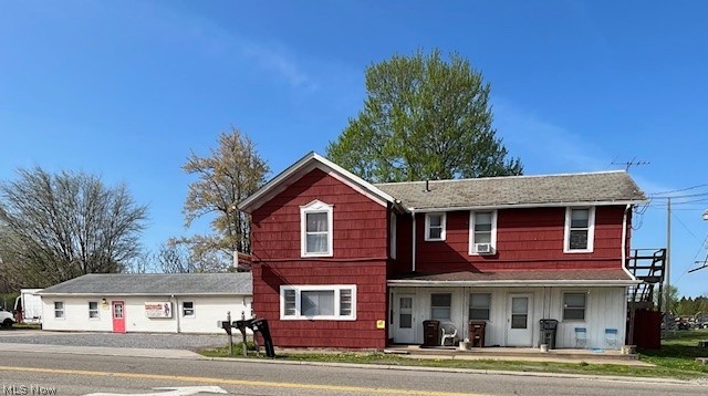 Income producing 3 unit residential property with additional commercial unit.  Nicely located on Rt 14 at Tallmadge Rd. Currently leased with expiring leases going month to month.