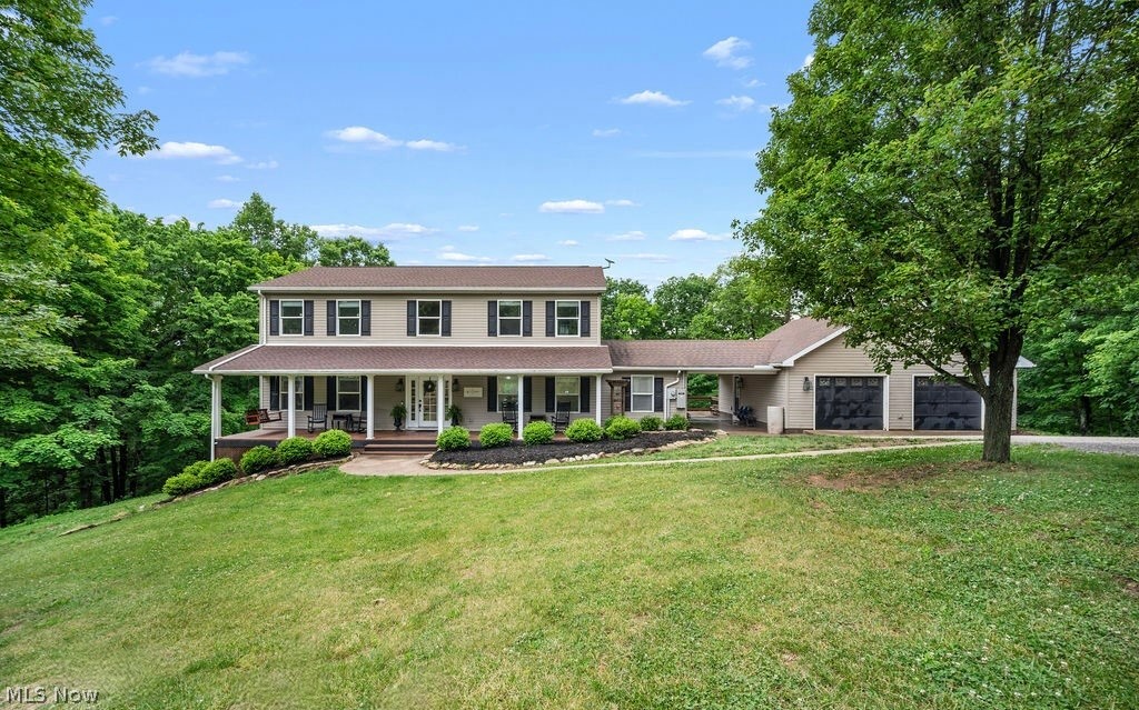 Hidden beyond a private drive and tucked among 16.34 beautiful acres in Mineral Wells, this home has been the backdrop for a life well lived. A place where children have grown up exploring the woods, splashing in the pool, riding bikes down the driveway, and learning the kind of freedom only the countryside can give. The family dogs roam happily here, greeting each new day with open fields, fresh air, and endless room to run. And somewhere along the way, this special property earned the perfect name…Hummingbird Hill. Perhaps because life here feels alive in all the best ways. Expansive decks offer views of hummingbirds fluttering about and the morning sunlight filtering through the trees while afternoons are filled with laughter and muddy boots kicked off at the breezeway door after another adventure outside. Inside, the home was built for togetherness while still finding peaceful corners to retreat and unwind. With 5 bedrooms, 3 1/2 baths, sprawling living spaces, and an expansive basement, there is room for everyone to gather comfortably without sacrificing personal space. Beyond the home itself, the property opens the door to a lifestyle so many buyers dream about but rarely find. The buildings, chicken coops, and usable acreage, create endless opportunities for homesteading, recreation, animals, entertaining, or simply enjoying the rhythm of country living. But what truly makes this offering unforgettable is not just the impressive square footage or the incredible amenities. It is the feeling you get when you are here. The quiet. The beauty. The open sky. The sense of home. Come experience Hummingbird Hill for yourself.