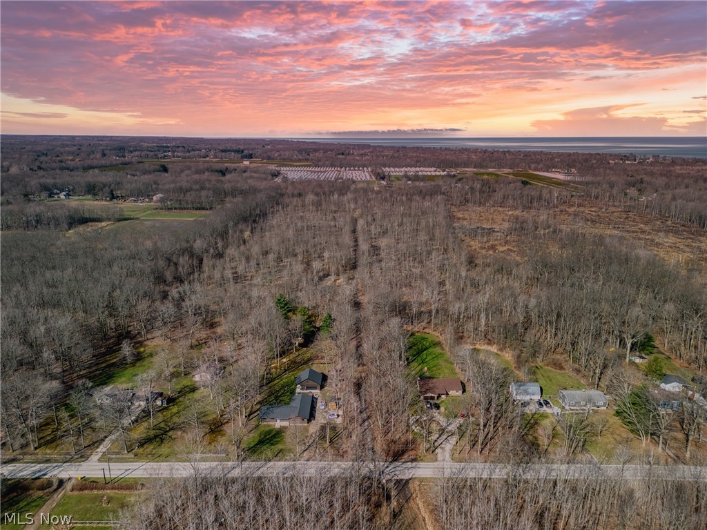 Discover the perfect blend of privacy, nature, and opportunity with this 37.5 acre wooded retreat. Featuring two scenic ponds and abundant wildlife, this property is a dream setting for hunting, recreation, or simply enjoying the outdoors. An unpaved road runs the full depth of the lot, providing easy access throughout the property. With electricity, public water, and phone lines available at the street, the land is well-suited for a future home, cabin, or outbuilding. Ideally located just 5 minutes from North Madison and 10 minutes from Geneva-on-the-Lake, you?ll enjoy the peace of country living without sacrificing convenience.