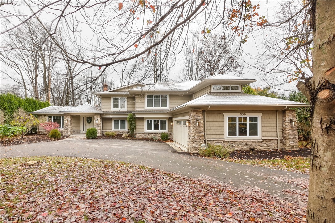 Extensively renovated in 2011 by Payne & Payne, this 5 bedroom, 4 full bath home boasts a 1 acre private lot with 100 feet of Chagrin River Frontage. The first floor features a Great Room, open concept Kitchen, Hearth Room & Dining Room, office and bonus room/playroom. Spend your days enjoying the view and wildlife on two porches or from the three season room. Sprawling Master Suite on second features two walk in closets and a private balcony that overlooks the wooded backyard and river. The second floor has four additional bedrooms and three full baths. The walk-out basement also features a built-in sauna. This home will be professionally landscaped, the deck will be repaired and power washed and the seller will have the carpets professionally cleaned. Conveniently located near The Village of Chagrin Falls for easy access to shopping, restaurants, parks and the extensive community events that take place throughout the year. Award winning Chagrin Falls Schools.
