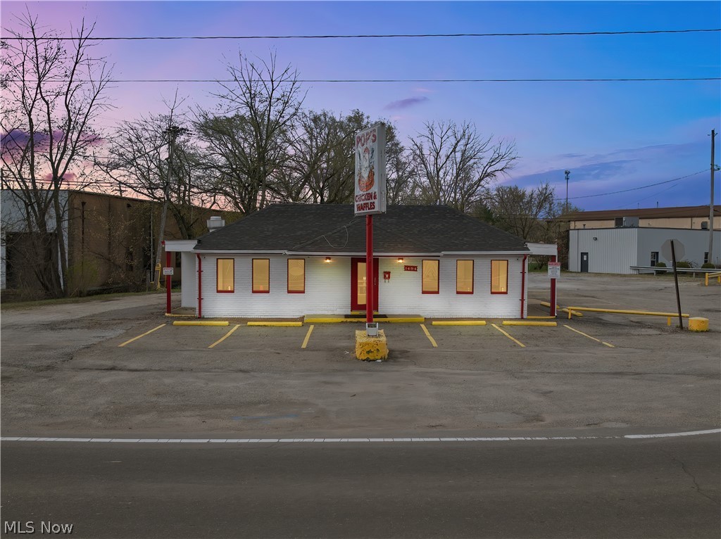 Discover a fantastic opportunity to own or lease a versatile 1,946 sq. ft. commercial building perfectly suited for a restaurant, café, or bar. Situated on a high-visibility corner lot, this property offers easy access and excellent exposure. Inside, the space features a built-in counter with bar stool seating, creating an inviting and casual dining experience ideal for walk-ins, regulars, and happy hour crowds. The open layout provides flexibility for both front-of-house dining and kitchen operations. Additional highlights include Dedicated parking lot with ample space for guests and staff, Bonus garage/storage area in the back, perfect for deliveries, prep space, or equipment storage, Prominent Street frontage with signage opportunities on both intersecting streets, Move-in ready for your restaurant vision or easily customizable for your concept. This location is a rare find whether you're expanding your brand or launching your first dining venture, it offers everything needed for success in one well-positioned package.