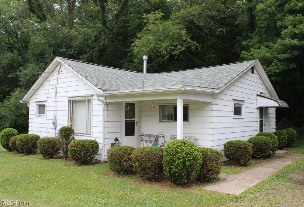 Delightful quiet & private setting on .864 acre, dead end street* Spacious kitchen, eating area & master bedroom* Furnace, A/C, H20, shingles (single layer) approx. 10 years* Softener 2009* Basement with glass block windows & shower* Updated exterior doors* Covered porch* Detached 1+ car garage* Home warranty provided* Well & Septic inspection completed* Immediate possession* Parcel was split from 5102838 and was assigned a new parcel number* Taxes to be determined*