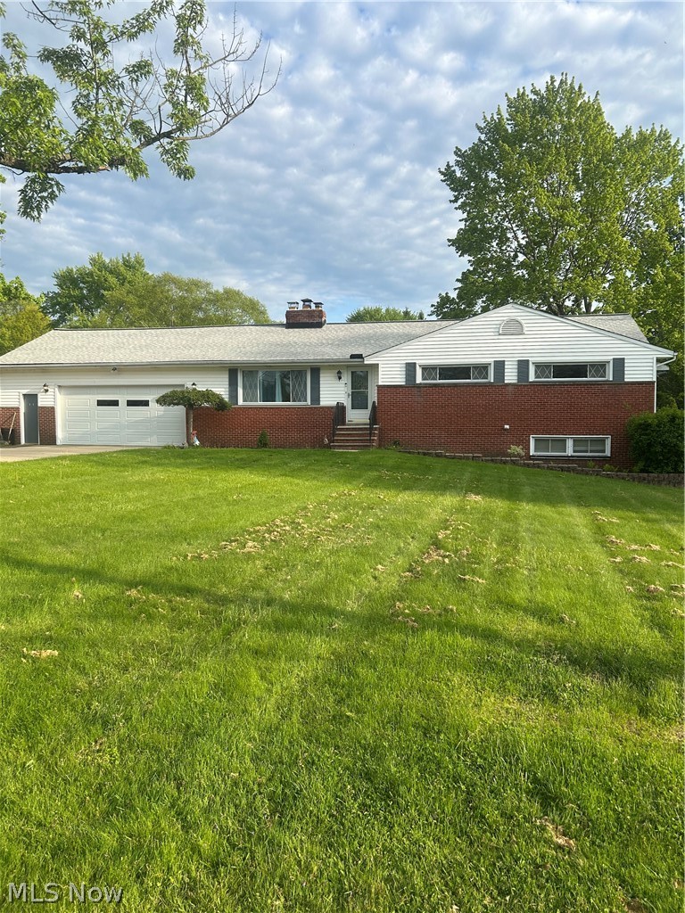 A must see beautifully remodeled ranch. Walk in front door to a spacious living room with wood burning fireplace and newer LVP flooring. Continue into large kitchen that was totally re done in 2024 with new cabinets, marble counter tops, a huge island topped with marble, stainless steel appliances, modern backsplash and flooring. From kitchen enter the huge family room bathed in natural light from all the windows. This also leads to a totally enclosed 3 season room with sliding doors that take you onto outdoor patio. Hallway leads to 3 bedrooms and totally re done in 2024 bathroom with walk in shower. Master bedroom features another full bath from 2024 with jetted soaking tub and high end fixtures. Finished walk out basement offers another 1000+ sq ft of living space with entry to a fenced dog run, laundry area, half bath re done in 2024 and large space with a wet bar. Oversize garage could probably fit 3 cars and has entrance to 3 season room. Yard is almost 1 acre with gorgeous pond. Also in 2024: new roof, HVAC, updated electrical