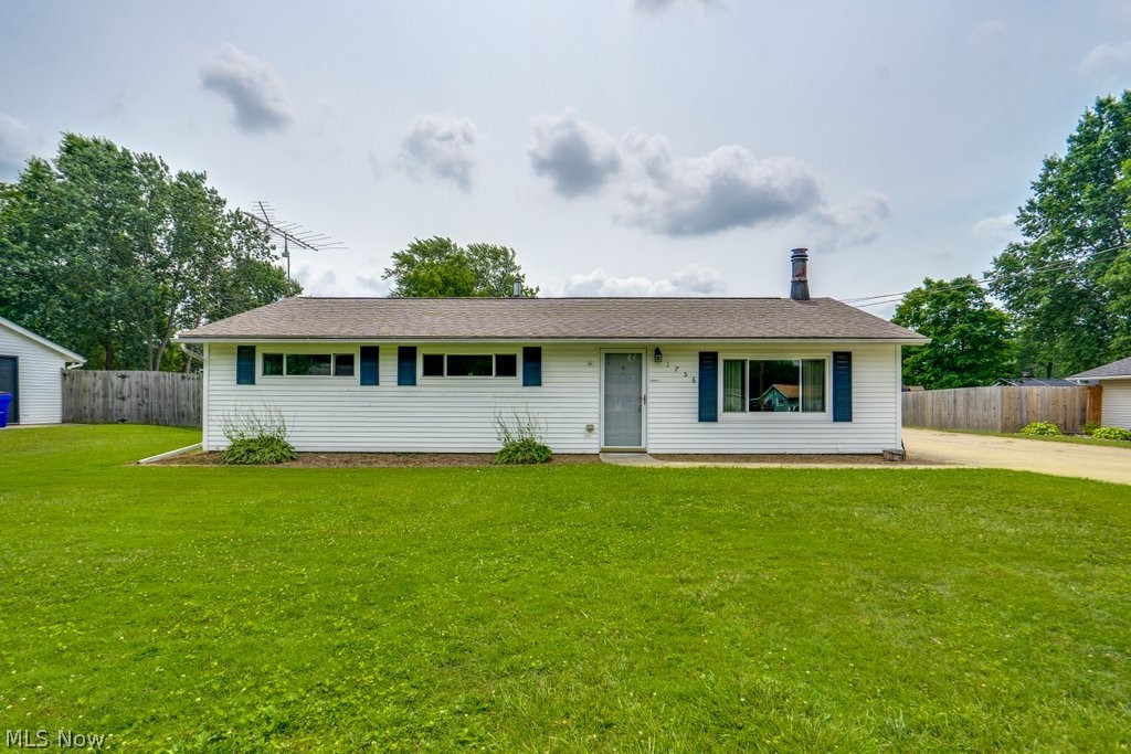 Come see this charming 3-bedroom ranch home in Streetsboro! The home features a comfortable single-level layout, a full bathroom, vinyl siding, and a cozy fireplace with a hearth. Outside, you’ll find a covered back patio that is perfect for relaxing or entertaining, along with a 2-car detached garage for additional parking and storage. Schedule your showing today!