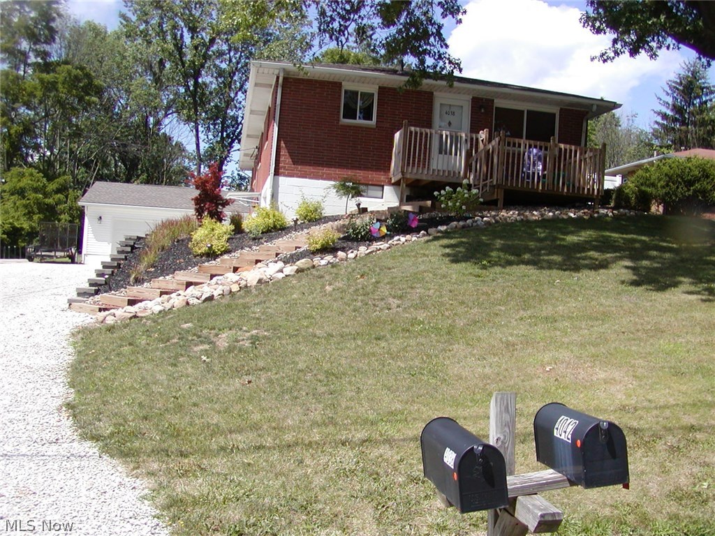 Lot 80 X 235: Beautifully updated ranchplex perfect for owner occupant. 3 bedrooms in updated front unit with newer kitchen, newer windows, central air and 1 car garage. Owner lives in back unit with 2 bedrooms, newer kitchen with ceramic tiled floor, island with butcher block counter, dishwasher, appliances ,beautiful hard wood floors in formal dining, bedroom and living room to privacy fenced patio area. Lower area has 11 X 16 master bedroom with 8 X 11 walk-in closet with sink and vanity and private shower bath, family room plus 2 car attached garage.  Roof 2011, windows--2010, hot water tank on owner's side--2017.  Storage shed in back. Dishwasher and microwave in owner occupied  unit only.  Total square footage  including the finished areas of the walkout basement on both sides is 1981 square feet.