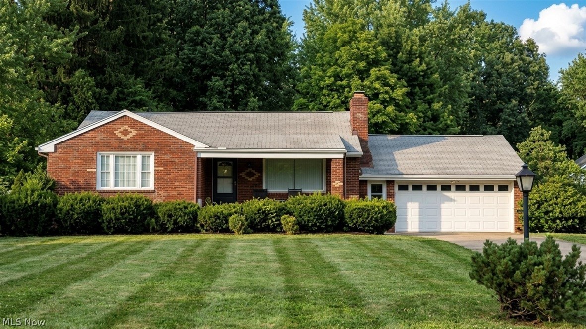 Updated brick ranch on nearly an acre in Poland! This move-in-ready home combines classic character with clean, modern finishes throughout. The spacious living room is filled with natural light and anchored by a striking stone fireplace. Luxury vinyl flooring flows through the main living areas, including the dining space and beautifully updated kitchen featuring white soft-close cabinetry, tile backsplash, dark countertops, modern lighting, and stainless steel Samsung appliances.

The home offers three comfortable bedrooms and two full bathrooms, including a primary suite with its own private bath. Both bathrooms have been stylishly renovated with contemporary fixtures and finishes.

A full basement provides abundant storage and excellent potential for a workshop, recreation area, home gym, or additional finished living space. Outside, the expansive lot offers plenty of room to relax, entertain, garden, or create the outdoor space you have been looking for. An attached two-car garage adds everyday convenience and additional storage.

Located minutes from the Poland Local School District, this thoughtfully updated ranch delivers one-floor living, generous outdoor space, and a convenient location. Schedule your private showing today!