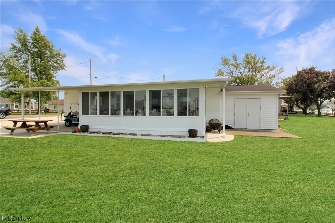 Waterfront ranch on Catawba with 60+ ft dock at the door! 3-bedroom, 2-bathroom split floor plan. Completely updated kitchen. Plus, a brand-new, extended paved driveway to park your water toys. Enjoy the tranquil harbor scenery of boats passing by from your waterfront sunroom. You will enjoy every memory of Lake Erie Living. Located near parks, marinas, vacation activities, shopping, dining, and fun in the sun! Call today to take a look.