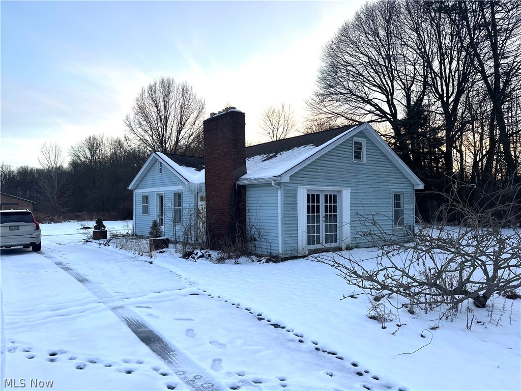 Welcome to this two bedroom, one bath ranch slab fixer upper. Septic will need replaced. Interior will need completely redone including some electrical, drywall, kitchen plumbing, cabinets, etc. Tons of potential in this fixer-upper. There is over 5 acres of land, including a horse stable/barn for your animals. Your kiddos can run and play for days on this country charmer. This is a cash only sale w/no bank financing whatsoever.