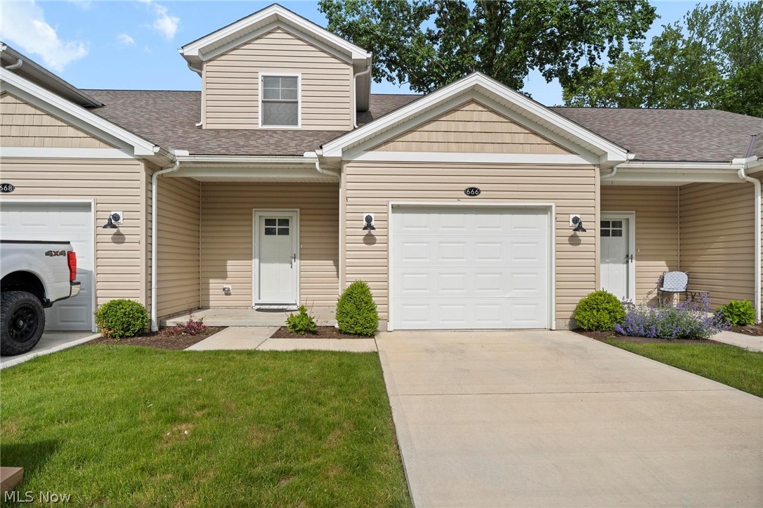 Maintenance free townhome near Lake Erie! This stunning 2 year-old, lightly lived in townhome offers modern style, space, and convenience in the Treadway Ponds community. Enjoy paved walking trails leading to Shell Cove Park and Lake Erie, perfect for outdoor lovers. The main level features a spacious living room open to the upgraded kitchen with premium cabinetry, stainless steel appliances, quartz counters and large walk-in pantry.  A first floor bedroom, sitting/dining room, and full bathroom complete the first floor.  Upstairs, the spacious owner's suite has a walk-in closet, and easy access to a full bath. A third bedroom, second floor laundry with a bonus room complete the layout.  Move-in ready, neutral colors, newer construction, attached one car garage, and low maintenance fees—schedule your showing today!