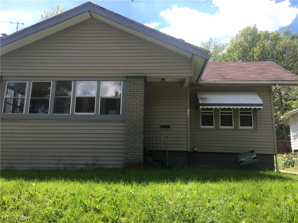 Currently an investment property. Lease ends in August. Cute bungalow . There is three season room in the front of home that enters into the large living room with a wood burning fireplace. (The fireplace was inspected about two years ago for use). between living room and kitchen there is a small dining area with builit ins. There are two first floor bedrooms in the back of the house. One bedroom has an exterior door with a wood ramp entering the home. The third bedroom is on the second story. There is a full size basement with one finished room that can be  a play room, office, work out room, etc. Please allow 24 hours notice to schedule showings.
