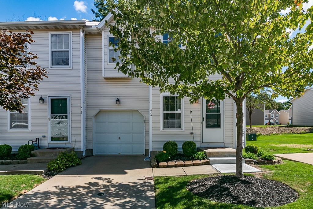 Fall in love with this beautiful condo nestled on a quiet street! A beautiful starter home where you can come and set your roots! This home features updated flooring in the kitchen and both bathrooms! A brand new deck - perfect for enjoying the outdoors! Come and make this one yours!