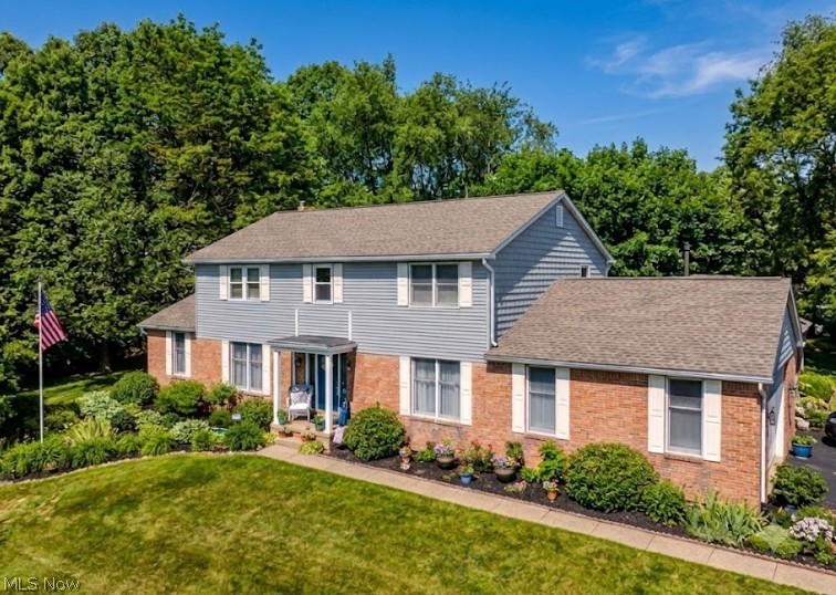 Welcome to Your Forever Oasis in Louisville! Prepare to fall head over heels for this breathtaking Colonial estate—a rare jewel on a sprawling 1+ acre lot. While the home inside is magnificent, the true star is an unbelievable, resort-style backyard oasis.
A Backyard Beyond Imagination! Step into your own private sanctuary framed by perennials, flowers, and mature trees. Relax to the soothing melodies of an elegant, custom water feature near your patio. Host unforgettable gatherings on the expansive deck and patio, gather around the fire pit, or melt the day away under the stars in your private hot tub. Elegant & Versatile Luxury Inside: Step indoors to find a seamless floor plan with fresh paint and stunning new flooring. The Main Level: Host in formal living and dining rooms with a huge butler’s pantry. Gather in the open kitchen, dinette, and family room with a cozy gas fireplace. Rare Multi-Gen Wing: Brilliant first-floor accessible suite with 2 bedrooms and a full bath, plus laundry. Second Floor Hideaway: Three massive guest bedrooms, a full bath, and a private primary suite boasting a newly remodeled 5-foot shower. Lower Level: A fabulous, finished recreation room and massive storage. Turn-Key Perfection (Ultimate Peace of Mind!) Every major update is done! Enjoy premium, worry-free living:  2026: New fridge, 2nd-floor luxury vinyl/carpet, ceiling paint, porch roof, sump pump, master shower. 2025: Brand new high-efficiency HVAC & garage door opener. 2024: Sleek 1st-floor deluxe vinyl flooring. 2023/2022: Finished lower level, dishwasher, custom patio & water feature. 2021: New main roof & premium siding.  Your Happily Ever After Awaits! This masterpiece has it all—space, style, multi-generational flexibility, and an outdoor paradise. Call today to schedule your private tour!