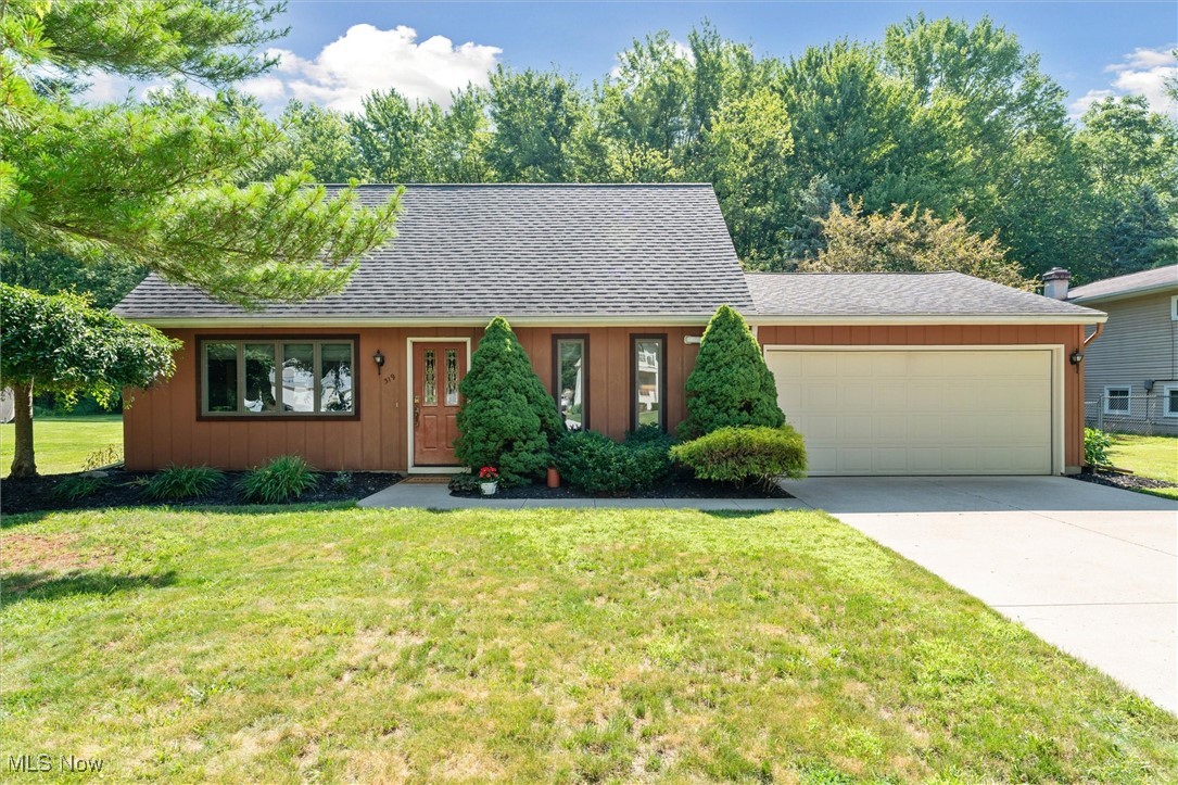 This tastefully remodeled and impeccably maintained home is located on a quiet, dead-end street in a beautiful neighborhood, within walking distance to Oberlin college campus and the community walking trails.  Step inside and discover a unique floor plan designed for modern living! The spacious main level features dedicated areas for living, dining, a gourmet kitchen, a productive home office, and a versatile music/hobby room. A magnificent rear great room, complete with a cozy fireplace and en-suite full bath and laundry facilities, offers the flexibility for a convenient first-floor primary suite, making true one-floor living a distinct possibility.  The fully remodeled kitchen (2021), is a highlight, featuring new cabinets, exquisite quartz countertops, stainless steel appliances, a practical pantry, and a central dining/breakfast island. Every detail has been considered, from the completely remodeled bathrooms with new fixtures to the updated lighting, fresh neutral paint, newer flooring, and contemporary interior doors throughout. For enhanced comfort and efficiency, the home is equipped with heating and cooling mini-split units. Adding to its appeal, a unique, free-standing studio with a loft at the rear of the property backing against the existing woods, provides an ideal space for a quiet creative retreat, a productive home office, or a fun hangout spot. This home is truly move-in ready – schedule your visit today!