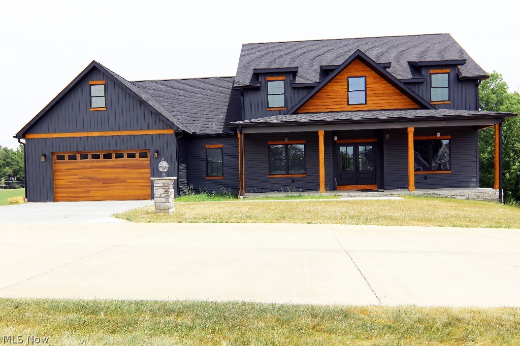 Experience modern farmhouse living at its finest with this picturesque retreat nestled on 1.11 acres of stunning countryside. This charming residence boasts a stylish yet timeless design, featuring an open-concept layout, gourmet kitchen, luxurious master suite, and versatile bonus room. Outside, enjoy panoramic views from the bedrooms or expansive porch. With convenient access to Parkersburg/ Vienna, this property offers the perfect blend of rural tranquility and modern convenience. Don't miss the opportunity to make this your dream home.
