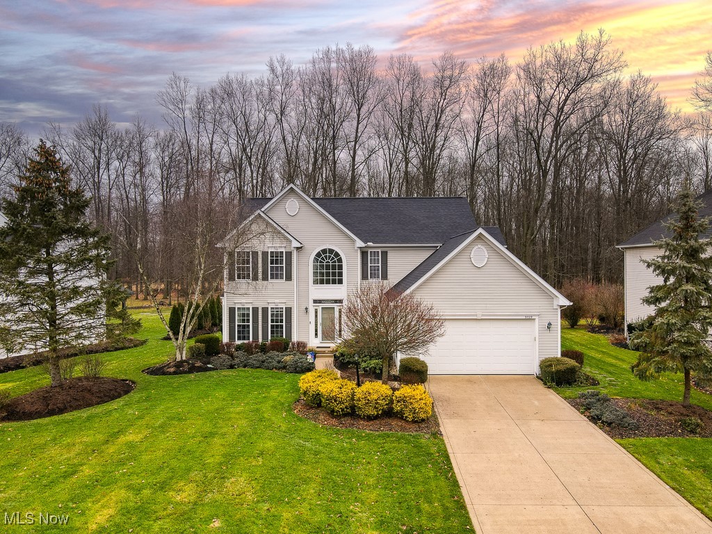 This beautifully maintained home offers the space, comfort, and setting today’s families are looking for, tucked into a quiet community with a neighborhood pool and surrounded by a large, private wooded lot that feels like a retreat. Inside, the home is spotless and thoughtfully laid out, featuring four generously sized bedrooms upstairs and three baths, including a spacious primary suite with double sinks, soaker tub and separate shower designed for rest and privacy. The heart of the home is the wide-open living area that flows seamlessly into the kitchen and dining space, creating the perfect setting for everyday family life and effortless entertaining. A formal living room and formal dining room provide additional flexible spaces for gatherings, homework, or quiet evenings in. Step outside to enjoy a custom patio with a tranquil water feature—an ideal spot to unwind while kids play and explore the peaceful backyard. A full unfinished basement offers endless potential for future living space, whether you envision a playroom, home gym, or media room. Clean, well cared for, and filled with natural light, this home delivers room to grow in a serene setting that truly feels like home. As part of this listing , qualified buyers may be eligible for an interest rate reduction -  subject to underwriting and lender terms.
