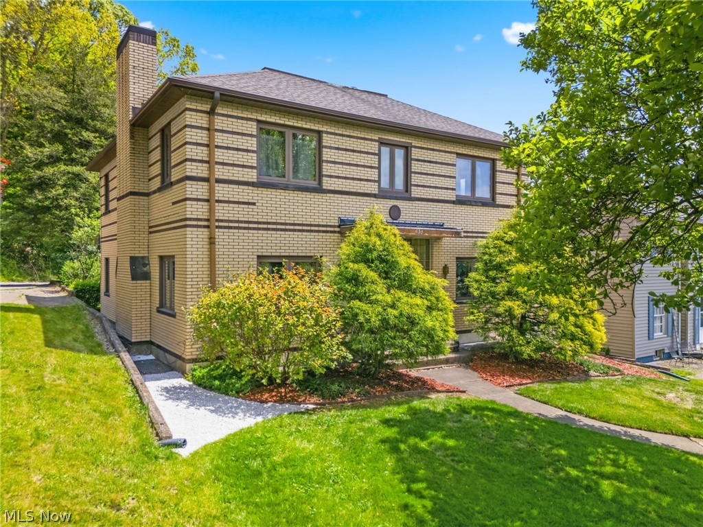 Built in 1939, this art deco inspired home is in pristine condition with many amenities. This spacious kitchen has a walk in pantry, lots of cabinetry and counter space for meal prepping and built in breakfast nook over looking the private back yard. Appliances are included. Moving on there is a 2 tiered formal dining area with lots of natural light. Step up to the foyer to the massive living room with an Italian glass fireplace and mantle, (Seller has not used the fireplaces), and built in book shelves. Again there are lots of windows for natural light. The first floor has all white carpeting except the kitchen .The second level has a a master bedroom and 2 guest bedrooms, plus a nursery or a sewing room. The bath has a separate shower and separate bath tub, there is a laundry hookup in the bath, (seller has never used.) There is no shortage of storage space in this house. There are cedar lined closets and all closets have automatic lighting when opened. The bedrooms have dedicated light switches for electric outlets and the home has plenty of electrical outlets thru out. The seller says there is oak hard wood flooring under the carpet. The lower level consists of huge family room area with fireplace and a bar, a laundry room, a furnace/ utility room. The roof new in 2018, updated double paned windows thru out, (still under warranty), just replaced 5 windows in 4/26.  The exterior is meticulously landscaped with perennials and flowering bushes and trees with a detached 2 car garage and covered back porch to enjoy the private quiet back yard.  This home shows pride of ownership. Don't miss this opportunity to own this unique home with all its features. Sale is subject to seller finding suitable housing. NO SIGN POSTED. Agents please read broker remarks..