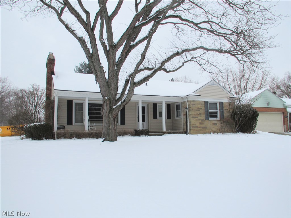 This custom-built home borders Big Creek Parkway, is located on a corner lot, and is one of the best locations in Parma Heights!  There are original hardwood floors throughout the main floor, though the living area is carpeted, but the floors underneath are pristine.  This home is a diamond-in-the-rough with a superior floor plan....just needs updating to your preference.  The lower level is partially finished with a full bath.  There is a whole-house generator system in case of power outage.  The 2-car garage is attached to the home with a 3-season porch with French doors that lead to the back courtyard.  This is an estate sale and is being sold "as is."  Any furniture left behind is negotiable.  Executor of the estate will do no repairs.  .