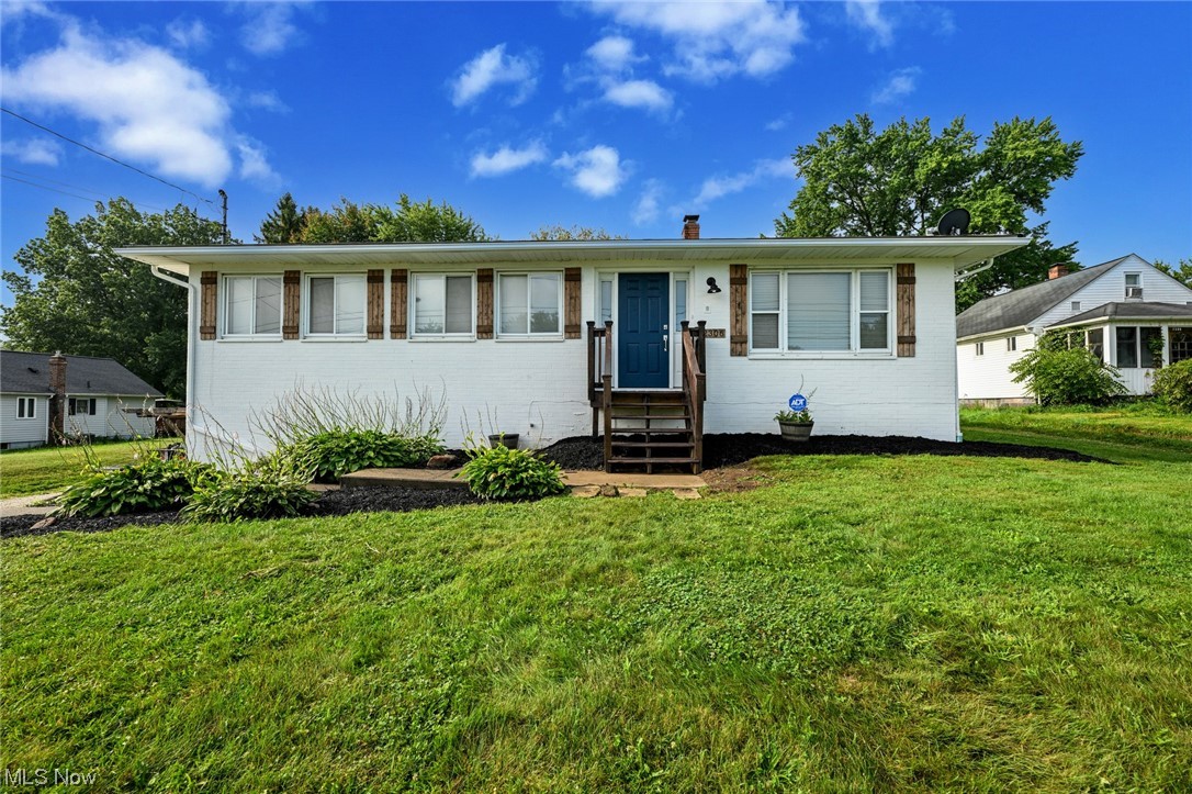 Looking for a property that has that has updated feel with endless options? Then this is the home for you. Brick Ranch that offers 4 Bedrooms, Finished Basement and 2 Car attached Garage. The house sits on a half-acre lot, with a fenced in area, outbuilding with greenhouse, and a paver/gravel area perfect for a patio set and playground! complete with a workshop area just off the garage that has water, electric, and heat. When you enter through the front door you will find a spacious and open living with a fireplace that has ship-lap wall, dining room area, and kitchen area (Refrigerator included) that has an open concept feeling along with granite countertops that outline the farmhouse sink. The 4 bedrooms on this level each offer additional options with an office area built into a wall in one room, along with a closet with storage possibilities in the master room that is a must see.  Bathroom has been recently updated upstairs, along with basement bathroom as well. You will also find a 4-season room through the sliders from the master bedroom and dining room. Downstairs you will find a cozy rec room with fireplace, and laundry/mudroom area. This home is a must see and will not last long!!! Schedule you're showing today!!!!