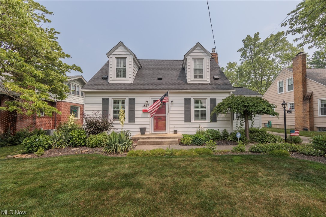 A remarkable Cuyahoga Falls cape cod with a 26'x19' garage 2+ car garage!  This immaculate home features an updated kitchen, and updated baths.  The huge living room and dining rooms have natural hardwood floors.  The quaint yard has a great garden, and patio area.  There is a first-floor bedroom and full bath, as well as 2 ample sized bedrooms and the other full bath on the second floor.  Do not miss a full basement, fireplace, custom blinds, and so much more.
