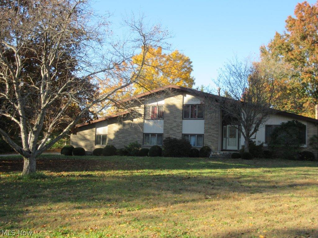 Cash buyers welcome to view this 2595 sq ft beautifully-designed all brick home - Creative ideas started ready to finish your way - 4 bedroom, 3.5 bath modern multi-level design with addition, 2 brick and stone fireplaces, built-ins and lots of storage, large sunroom near kitchen and formal dining room for easy entertaining. Level lot 165 x 215  Amazing all concrete drive and turn-around  Contractors will appreciate all this home offers. (Suffield Township,
Mogadore mailing and schools, Portage County)