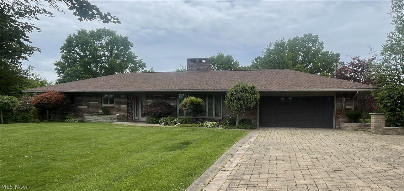 This first-time offering presents a rare opportunity to own a delightful, highly versatile ranch home on Sunrise Drive in Byesville, combining comfortable living, a prime location, and exceptional value. Featuring three to four bedrooms and three full bathrooms, the main level boasts a spacious kitchen and a beautiful, light-filled sunroom that overlooks a private backyard oasis equipped with an inviting in-ground swimming pool, an expansive patio, and a cozy firepit. The entertainment potential doubles in the massive finished basement, which expands the living space with a family room anchored by a fireplace, a dedicated billiard room complete with a pool table, and a full bar with a second kitchen for seamless hosting. Perfect for summer gatherings, the lower level also features a convenient, direct stairway leading straight out to the pool area to keep foot traffic organized. Offering incredible peace of mind and personalization, this standout property also includes a generous $7,000 seller contribution at closing toward replacing the upstairs carpeting, allowing the new owner to tailor the final finishes entirely to their taste.