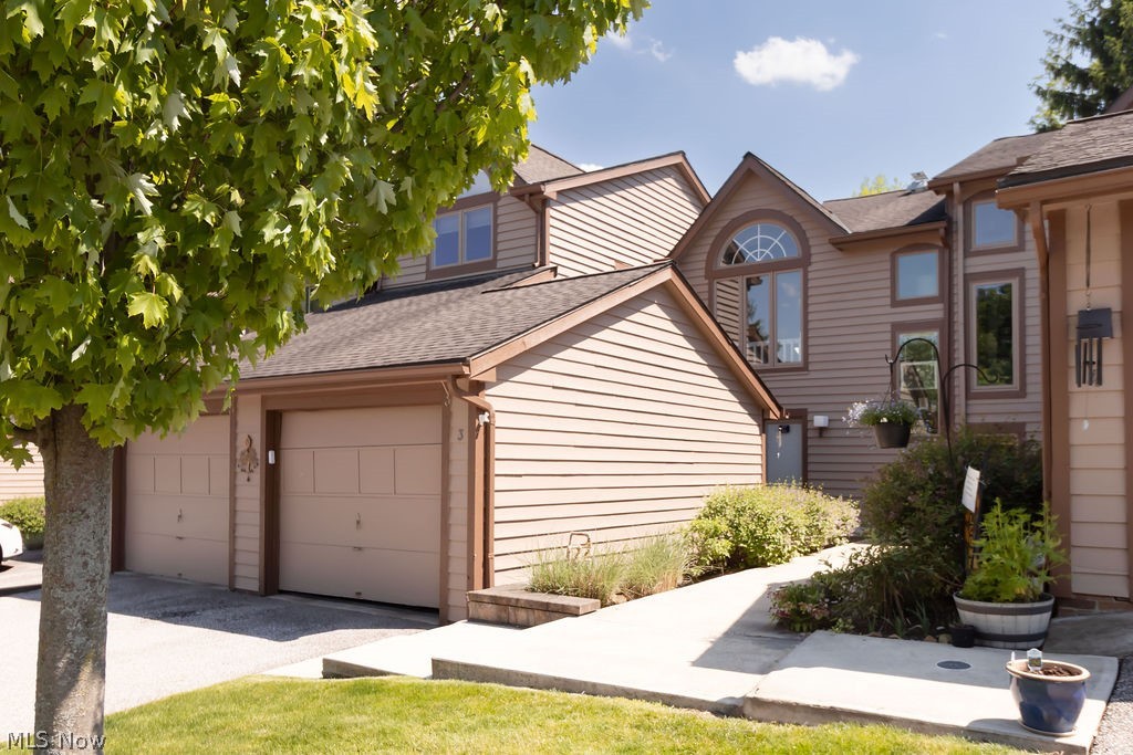 A MUST SEE!! Rare opportunity in the highly sought-after Village community of Beachwood! This beautifully updated condo offers the perfect blend of spacious living, thoughtful improvements, and an exceptional floor plan designed for today's lifestyle.

The desirable first-floor primary suite provides convenient one-level living, while the dramatic two-story family room showcases soaring ceilings and abundant natural light. The remodeled kitchen has been thoughtfully reconfigured to accommodate an island, creating an ideal space for entertaining, meal preparation, and everyday gathering.

A custom bump-out addition enhances functionality with a practical mudroom and first-floor laundry, complemented by an additional laundry area in the basement. Upstairs, you'll find two generously sized vaulted-ceiling bedrooms, a full bath, and a versatile loft overlooking the main living space - perfect for a home office, study area, or versatile additional living space.

Enjoy maintenance-free living in one of Beachwood's most desirable communities, complete with a clubhouse, fitness center, tennis courts, swimming pool, scenic lake, and beautiful walking paths. Just minutes from premier shopping, dining, parks, hospitals, and easy highway access. With its rare first-floor primary suite, expansive living spaces, and thoughtful updates throughout, this is a home that truly stands out from the rest. It will not last long, schedule your private showing today!!
