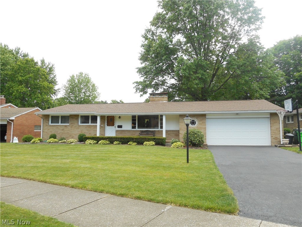 Warm and lovely all brick ranch offers spacious rooms with 2 fireplaces (in the living room and rec room).  Beautiful hardwood floors throughout most of the home!  Dining area has charming built in hutch.  Double sinks and large vanity offers lots of storage in bathroom.  Applianced kitchen is open to the family room with built ins and access to the awesome fenced in backyard with brick patio.  Three good sized bedrooms feature ample closet space.  The huge partially finished rec room has a fireplace and offers enough space for different uses.... there's even a full bath with walk in shower.  Home warranty offered for peace of mind.  Furnace, AC & Roof are less than 10 years old.  Hot water tank new June, 2017.  Great location - within walking distance to restaurants, festivals, & YMCA.
Make this home yours today!