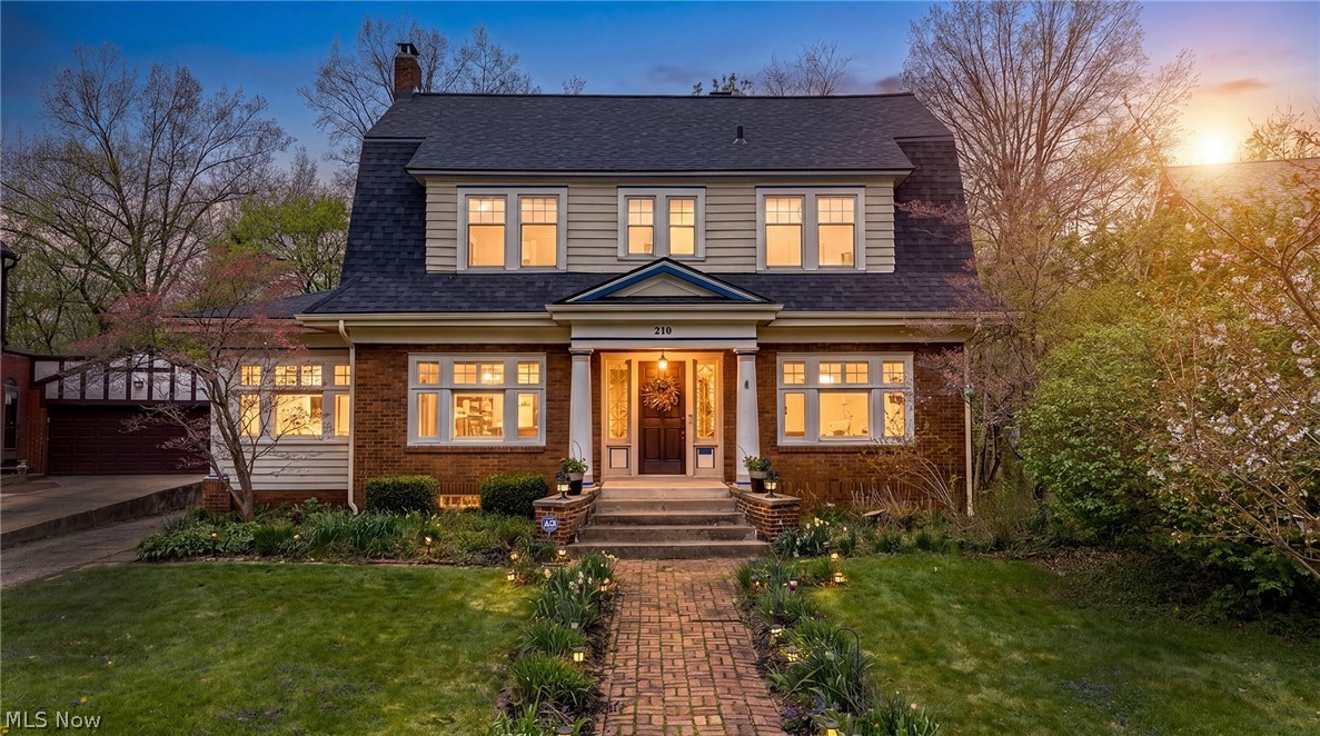 Spacious and beautifully updated, this Dutch Colonial blends classic architectural charm with modern 2026 kitchen upgrades and amenities. A brick walkway welcomes you to the inviting front porch and entry foyer. Inside, you’ll find original hardwood floors, six sets of French doors, transom windows on the first floor, and soaring ceilings throughout.
The expansive living room features detailed crown molding, a gas fireplace, and opens through double French doors to a sunroom/family room with its own fireplace. The dining room is rich with character, showcasing intricate wainscoting, chair rail, and crown molding—ideal for entertaining.
The large eat-in kitchen was renovated in 2025/2026 and includes quartz countertops, a center island with pendant lighting, a Samsung counter-depth refrigerator, JennAir downdraft gas range, updated windows, imported tile backsplash, and a wet bar. A back staircase leads to a half bath with a newer sink, as well as access to the screened porch, garage, and basement.
Upstairs, the second floor offers four generously sized bedrooms, two with walk-in closets. The updated full bath blends vintage ceramic tile with a newer vanity and lighting. Windows on this level were replaced in 2024, and there are two linen closets for added storage.
The third floor provides a versatile space with a large bedroom or playroom featuring arched windows, a built-in dresser, closet, office area, and a full bath with a newer sink and classic clawfoot soaking tub.
Additional updates include three Mitsubishi split heat/AC units (2023), forced air heat/AC for the living room and sunroom (2024), a complete roof and gutter replacement (2025), exterior repainting (2025), and a newly added second-floor rear roof deck (2025). 
This exceptional home is move-in ready and ideally located near shopping, parks, restaurants, and major highways.