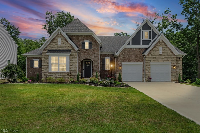 Luxury ranch living in a Drees-built Lyndhurst that is only a few years old & shows like new, set on a private wooded lot at the end of a quiet Brunswick street. Woods wrap the back & side, giving you a peaceful, serene setting you can enjoy every day.
The open concept layout lives large. LVP floors run throughout the first floor, where a spacious family room flows right off the kitchen. At the heart of the home is a large kitchen island topped with quartz counters, built for cooking & gathering. Step out to a covered deck that looks over the backyard & the natural wooded areas.
First floor living is done right, with 3 bedrooms plus a dedicated office. The primary suite is a true retreat with brand new luxury carpet, a large bath, an upgraded walk-in shower & a huge walk-in closet. The other two carpeted bedrooms share a smart Jack & Jill bath. A large first floor laundry room & a handy drop zone off the garage keep daily life easy.
The fully finished walkout basement adds a whole second level of living, finished in LVP throughout. It includes a full bath & a room currently used as a man cave. Two more large rooms with closets work as guest space, a craft room, a gym or whatever fits your life. The open finished area is ready for a media room, game space or entertaining. Walk out to a paver patio & take in the quiet.
You are close to it all. Grab dinner at Tapped and Forked, Cozumel or the many stops inside Market 42. Walk the trails at the Susan Hambley Nature Center or Brunswick Lake Park. Meijer, Giant Eagle & Brunswick Town Center are minutes away, with quick access to I-71.
Private, finished & move-in ready. Schedule your showing today.