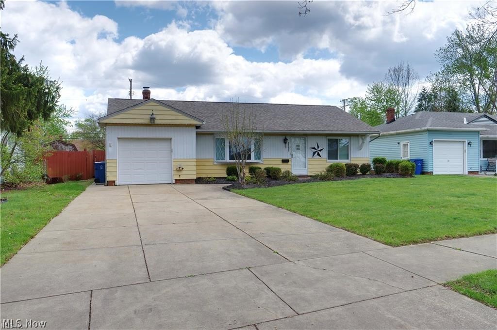 Welcome to 6751 Oakwood Road, located just minutes from I-71, I-480, and all the surrounding shopping, dining, and entertainment. As you pull up to the property, you’ll immediately notice the fresh curb appeal, featuring new landscaping, an updated garage door, vinyl siding, and a beautiful bay window overlooking the front yard. The roof was completely torn off and replaced just two years ago. Entering the front foyer, you’ll see fresh paint throughout, along with new fans in both the family room and the spacious addition room, which features dual ceiling fans, a wood-burning fireplace with a granite hearth, and plenty of natural light. The dining area just off the kitchen offers tiled flooring that extends all the way to the laundry room. The kitchen is beautifully updated with granite countertops, fresh white cabinets, and a matching tile backsplash. It also includes a new garbage disposal, a new sink with black fixtures, and updated cabinet hardware. Double can lighting brightens the space and leads you to the massive 19.8 x 15.4 addition at the back of the home with the second zone heating and back bedroom. The other two bedrooms and bathrooms, and a garage have heated floors. This impressive addition features large new windows overlooking the fully fenced backyard and concrete patio—perfect for entertaining. The backyard offers full privacy with a newly fenced yard. The home includes three nicely sized bedrooms with new lighting, ample closet space, and a beautifully renovated bathroom featuring tiled flooring, a modern vanity with a circular mirror, updated lighting, and a bright white tiled shower. Enjoy one-floor living at its finest. Come see what this modern ranch with extra square footage has to offer!