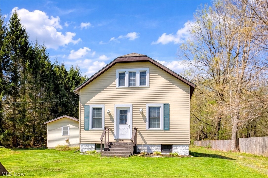 Sitting on 1.67 acres in the Buckeye School District, this home gives you plenty of room to spread out -- inside and out.  The wooded backyard is a ready-made adventure zone or a peaceful escape with plenty of apple trees.  Inside, there's a flexible layout that works for real life - including an in-law suite that's perfect for guests, teens or anyone who needs a little space of their own.  Love to cook or stock up?  The kitchen's got a walk-in pantry and a full extra set of cabinets--bring on the Costco runs!  First-floor laundry?  Yep, and it's a big one.  The oversized garage is ready for all your car, hobby or tinkering dreams.  With newer flooring, fresh paint, KraftMaid cabinets, central air and a big back deck, this place checks a lot of boxes and is ready to go.