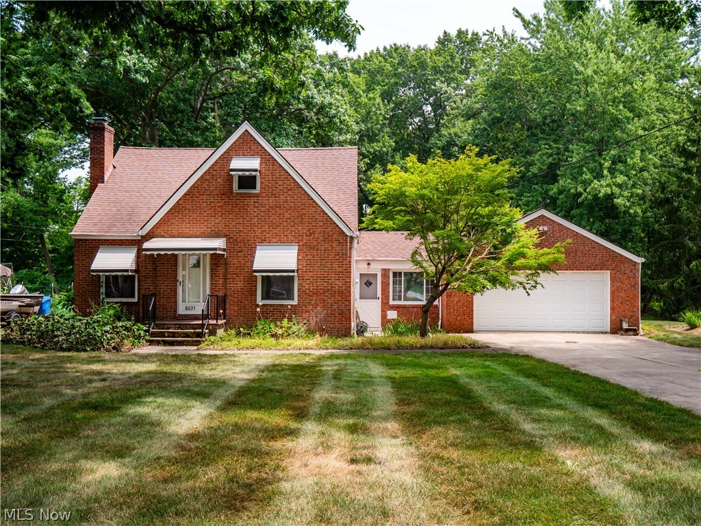 Opportunity awaits at this lovely 4 bedroom 2 bathroom home in the heart of Seven Hills! If you have been searching for a property with endless potential, this is the one. Bring your vision and creativity to transform this property into something truly special.

The home features a functional layout with four bedrooms, an eat in kitchen, and a cozy fireplace that adds warmth and character to the living space. A breezeway provides a convenient transition between the home and garage while offering additional flexible space for everyday living.

Several updates have already been completed, including a roof that is approximately 10 years old and newer replacement windows, a furnace installed in 2012, and central air replaced in 2013. 

The backyard is one of the property's standout features. Enjoy a spacious outdoor setting with a wood deck that is perfect for relaxing or entertaining, plus a storage shed (12x15) for lawn equipment, tools, and seasonal items. There is plenty of room to garden, play, or create your own backyard retreat.

Location is everything, and this home delivers. Conveniently located near shopping, restaurants, parks, major highways, and everyday conveniences, this property offers easy access to everything Seven Hills and the surrounding communities have to offer. Schedule a showing today because a rare opportunity like this will not last long!