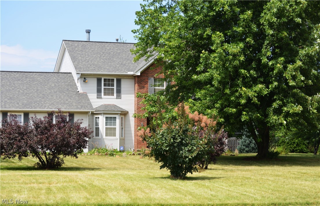 Welcome Home! A beautiful colonial is located on two parcels and has a park like setting while being in the heart of the city.  This 2300 square foot home features a formal living and dining room, open concept living, eat in kitchen, first floor laundry room, three full bathrooms and half bath on the first floor. The fully finished basement which can be used as a mother in law suite or additional family living. The kitchen has new granite counter tops and new back splash. The stone wood burning fireplace is the central focus in the living room. An eat in kitchen opens up to a new wood deck which provides additional seating for al fresco dining. The master bedroom boasts a cozy fireplace and a large bathroom with jets, a walk-in shower and walk in closet. You are minutes from the highway and downtown. A home warranty is included which will give you peace of mind. Make this your home today.